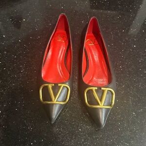 Valentino Black Flats with Gold Emblem
